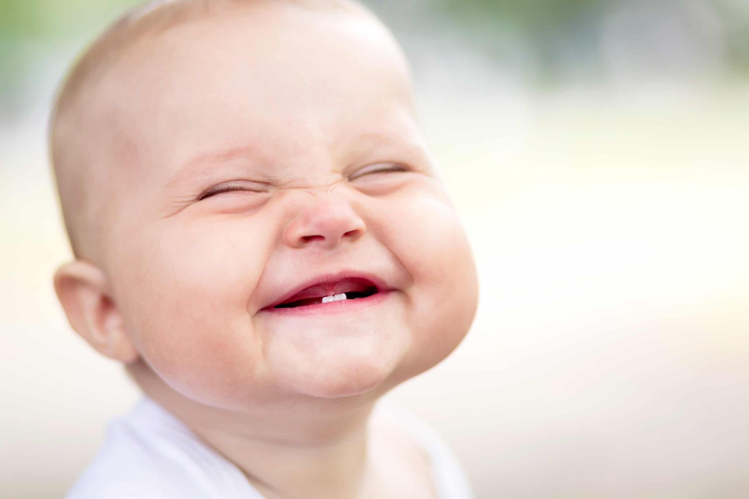 when do babies smile